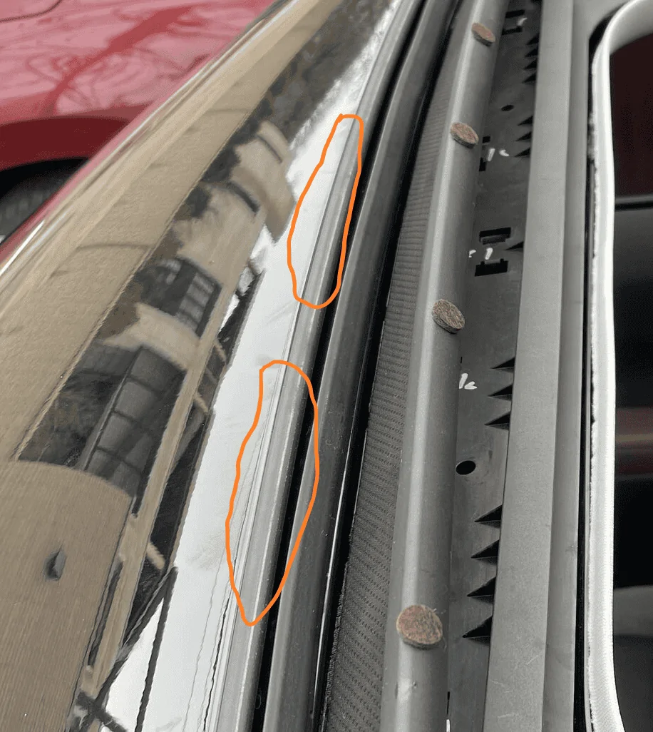 Buzzing/rattling sound around the front section of the sunroof? One