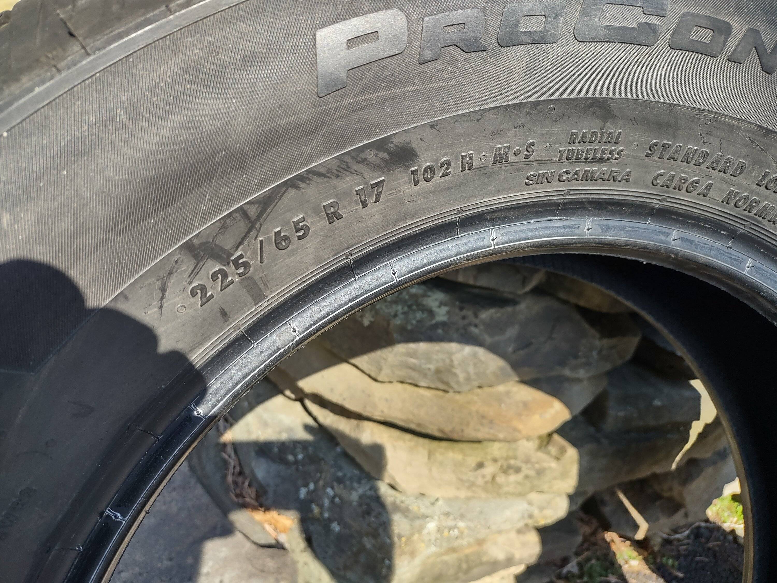 New York Four factory Continental ProContact TX 225/65R17 tires, about 1000 miles on them