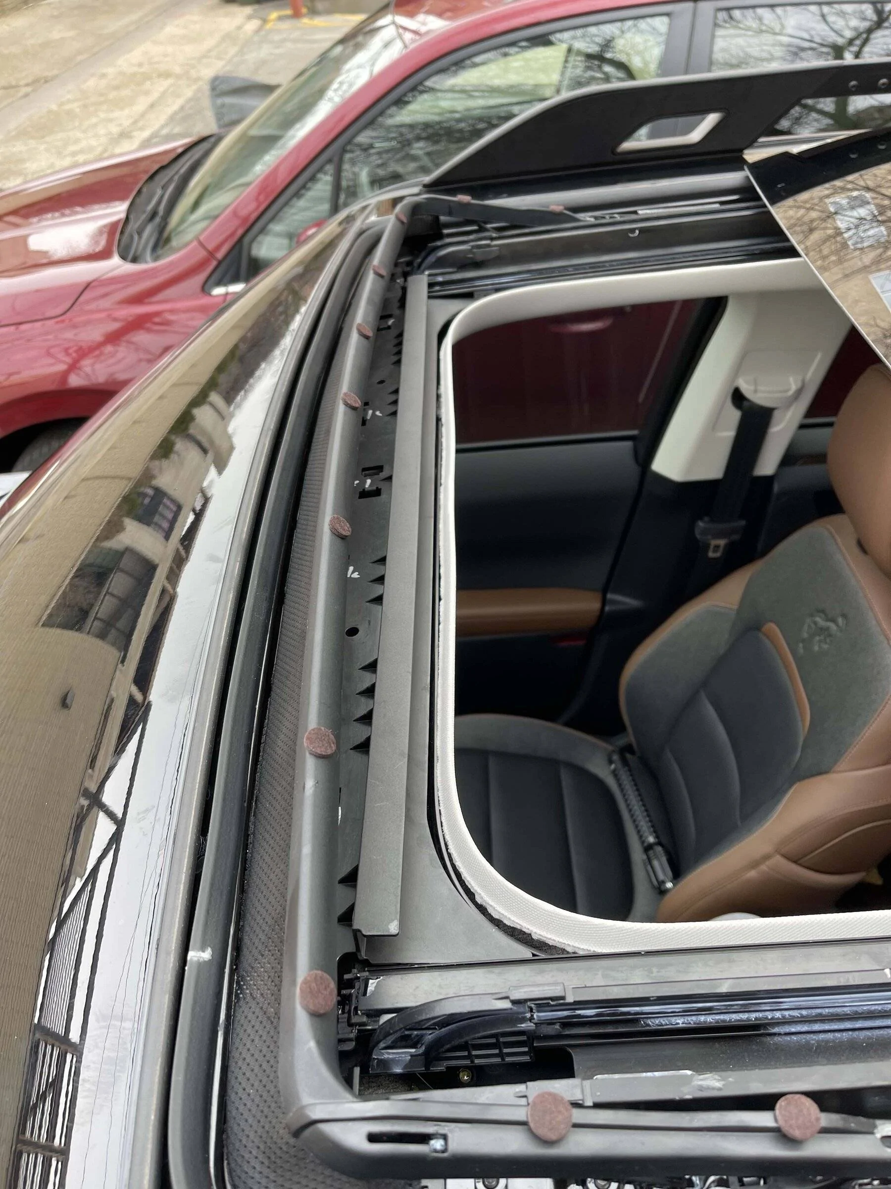 Moonroof creaking / squeaking when going over uneven pavement any